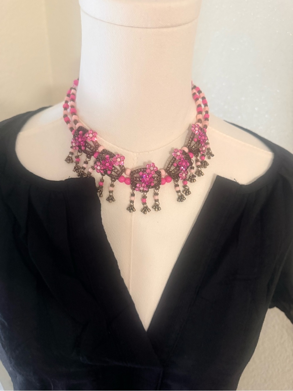 Vibrant Pink Beaded Statement Necklace with Ornate Charms